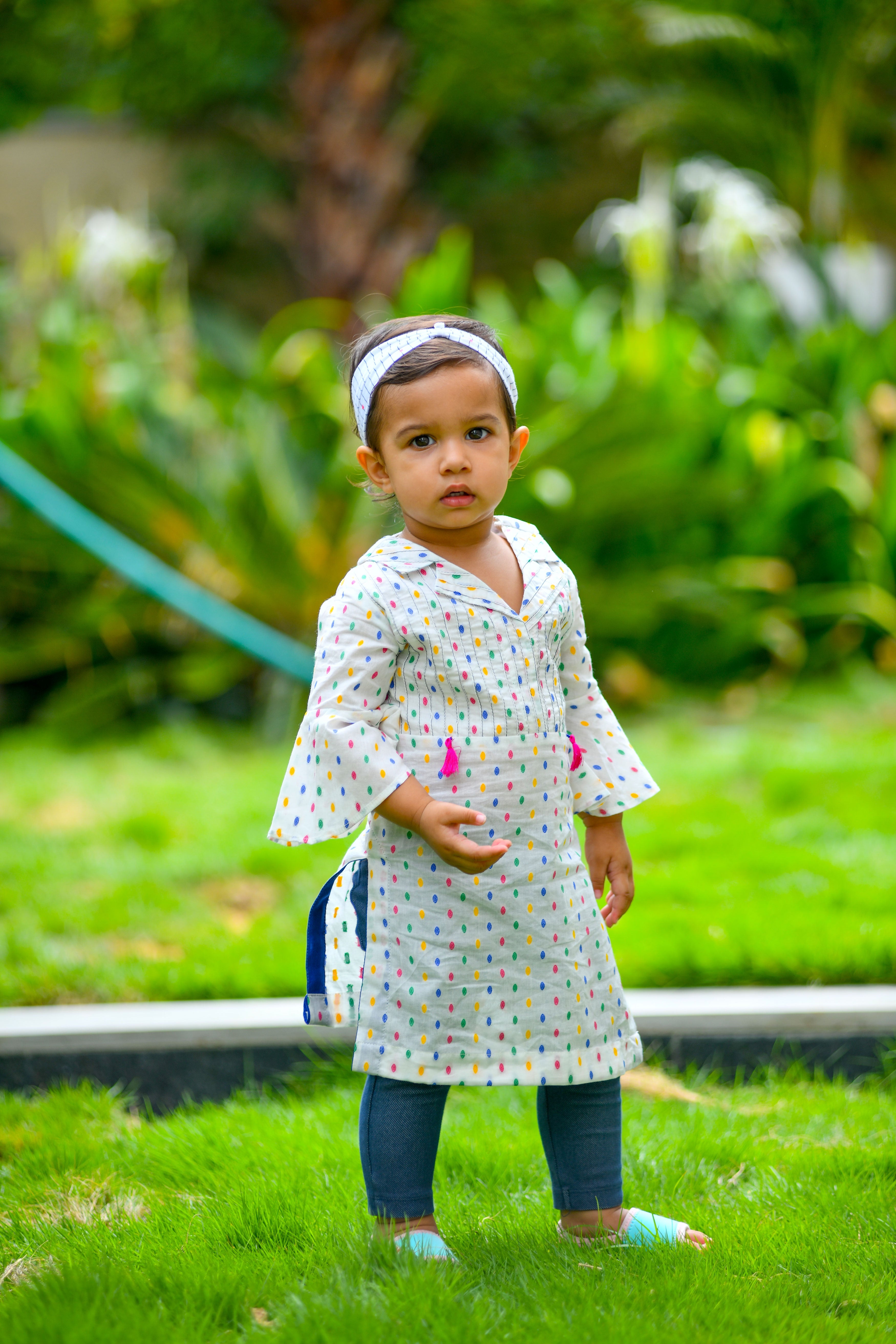 White pintuck kurta with tassels