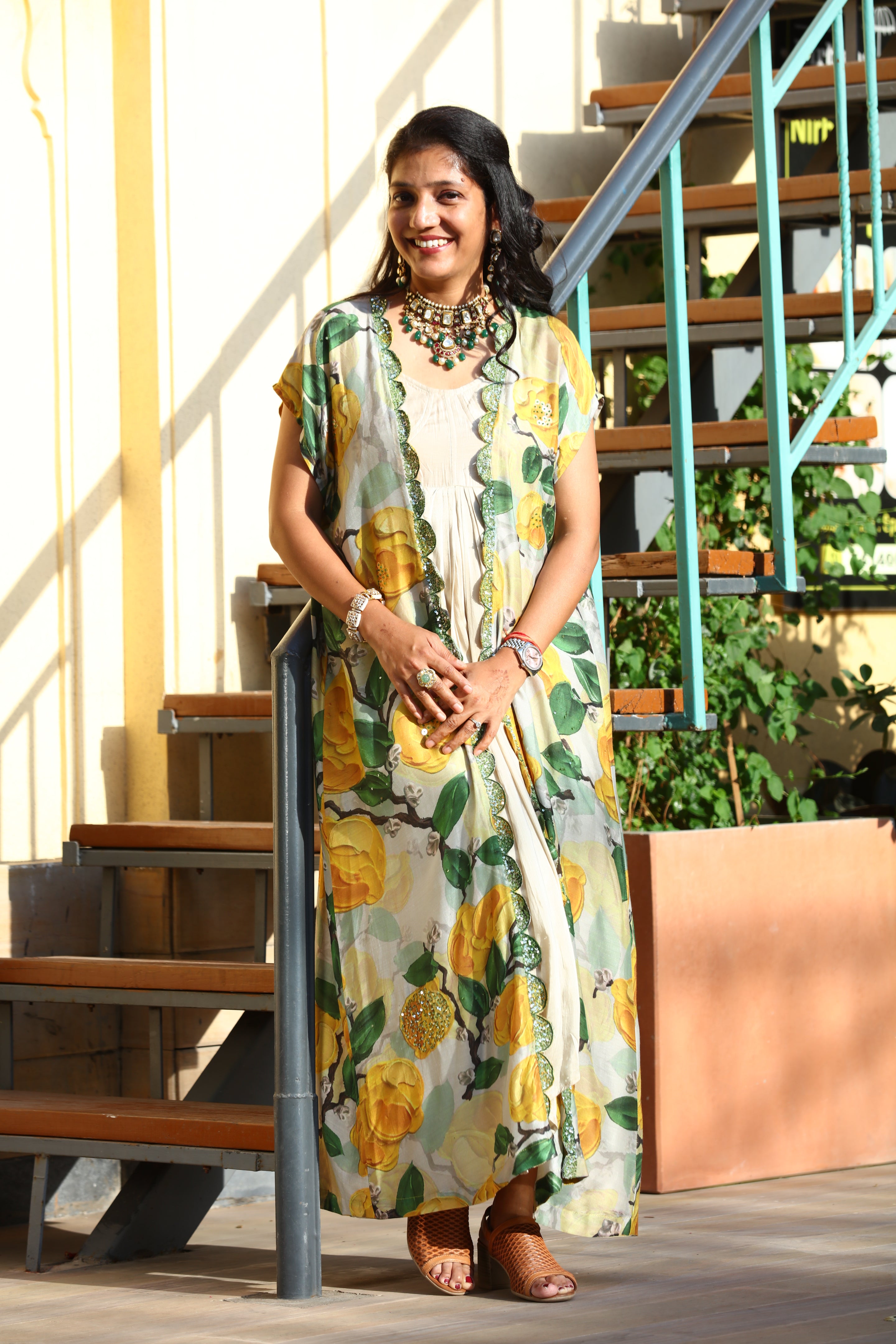 GOWN WITH EMBELLISHED CAPE