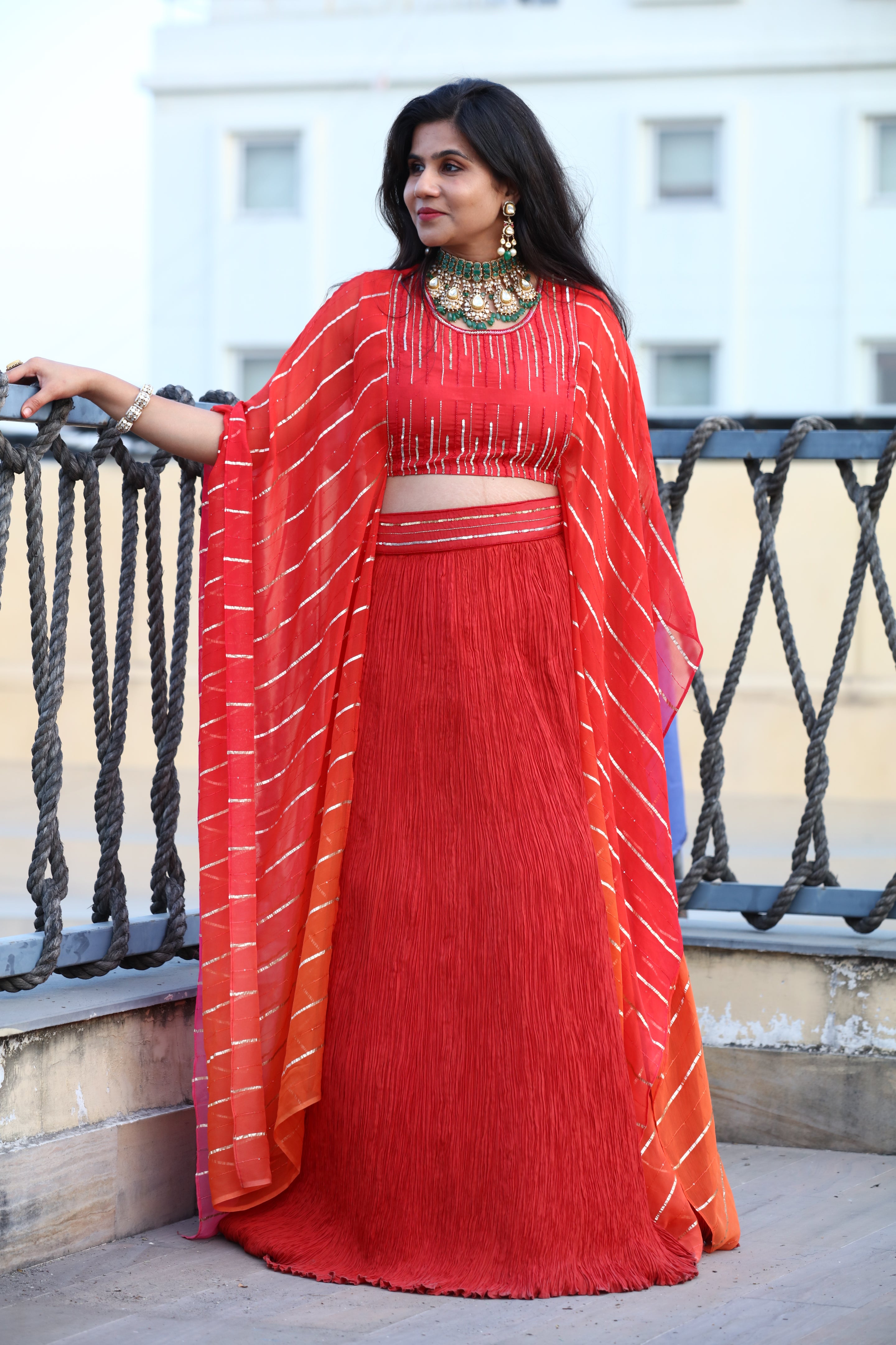 Red crushed skirt with embellished top
