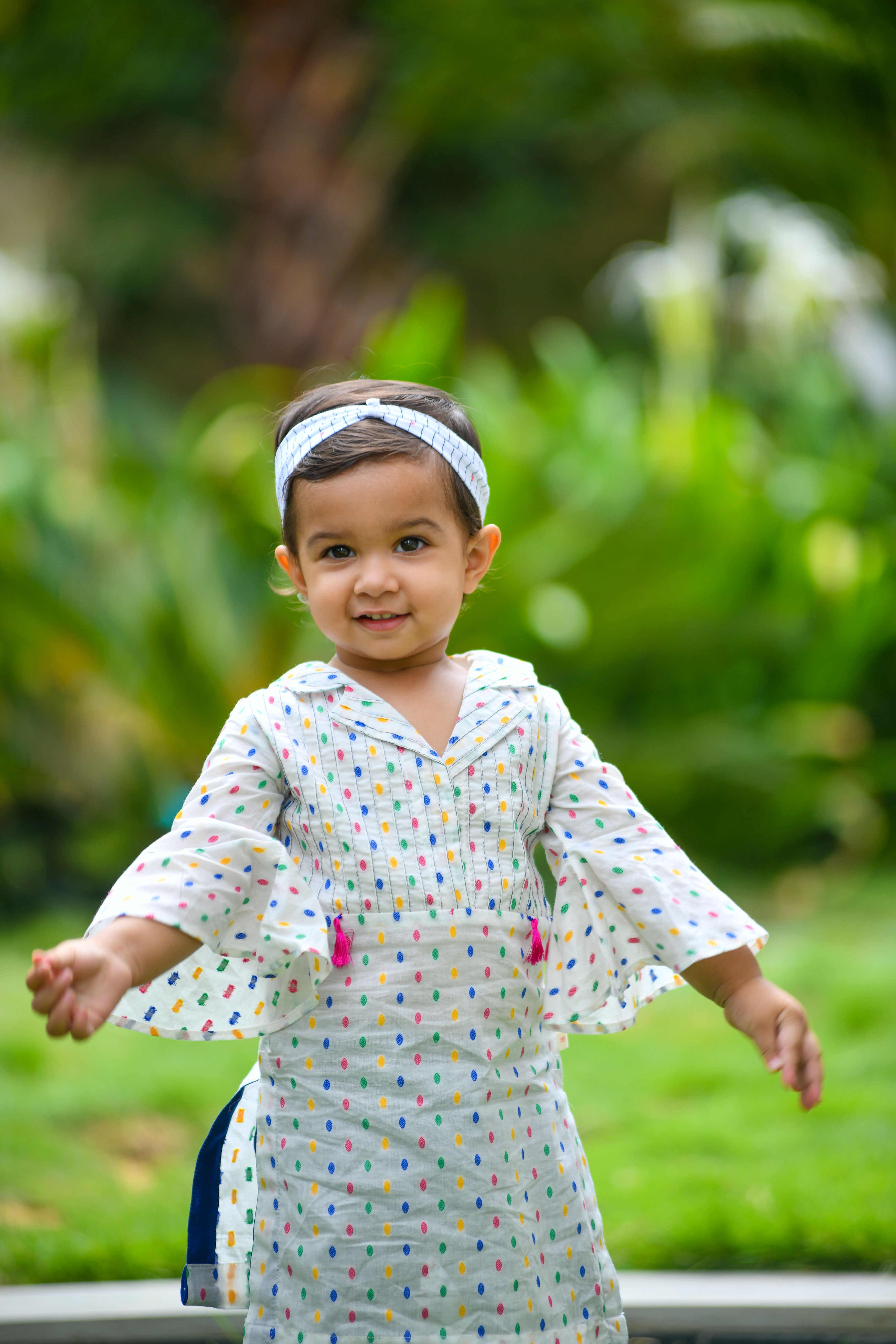 White pintuck kurta with tassels